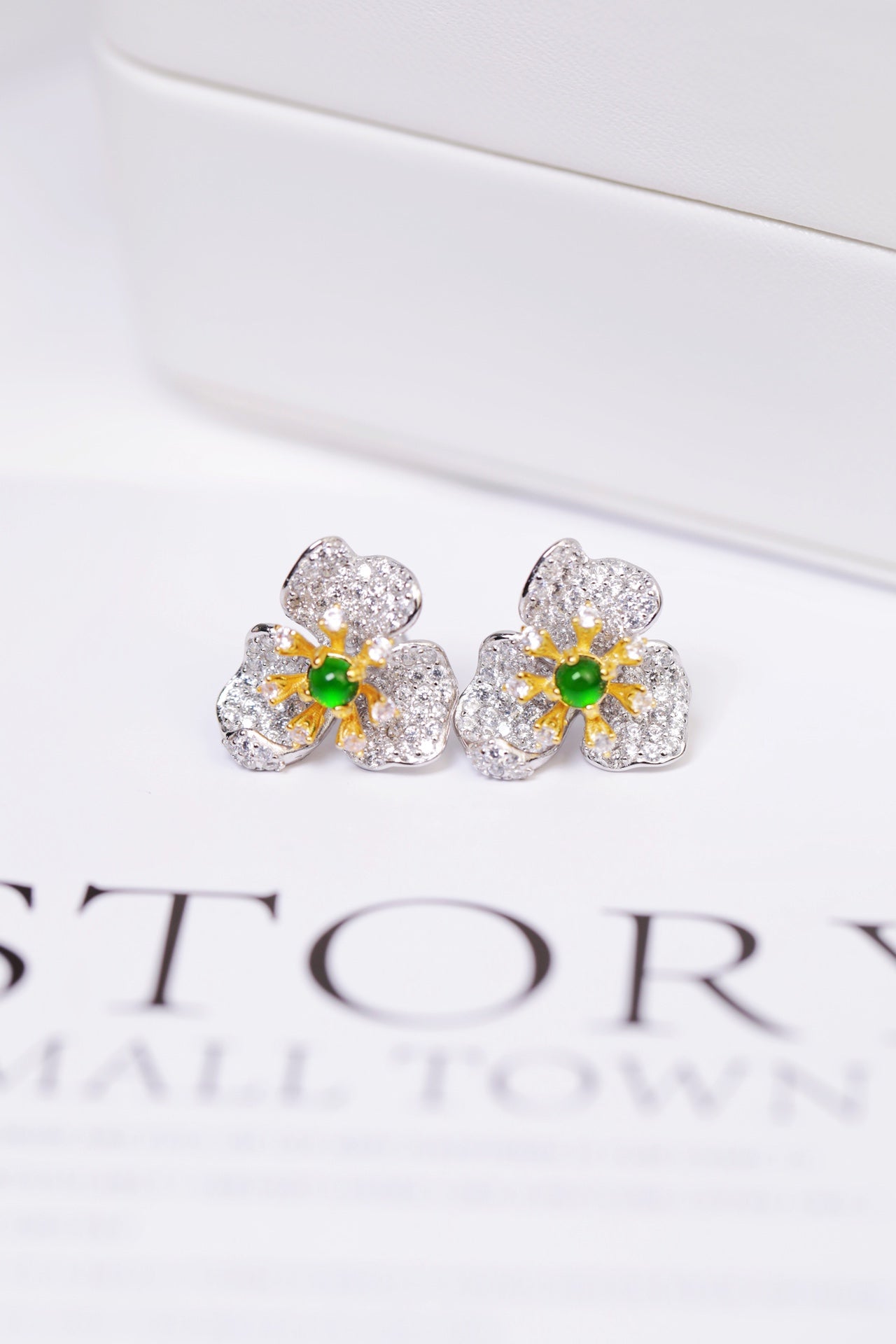 Diamond-Set Silver Flower Stud Earrings