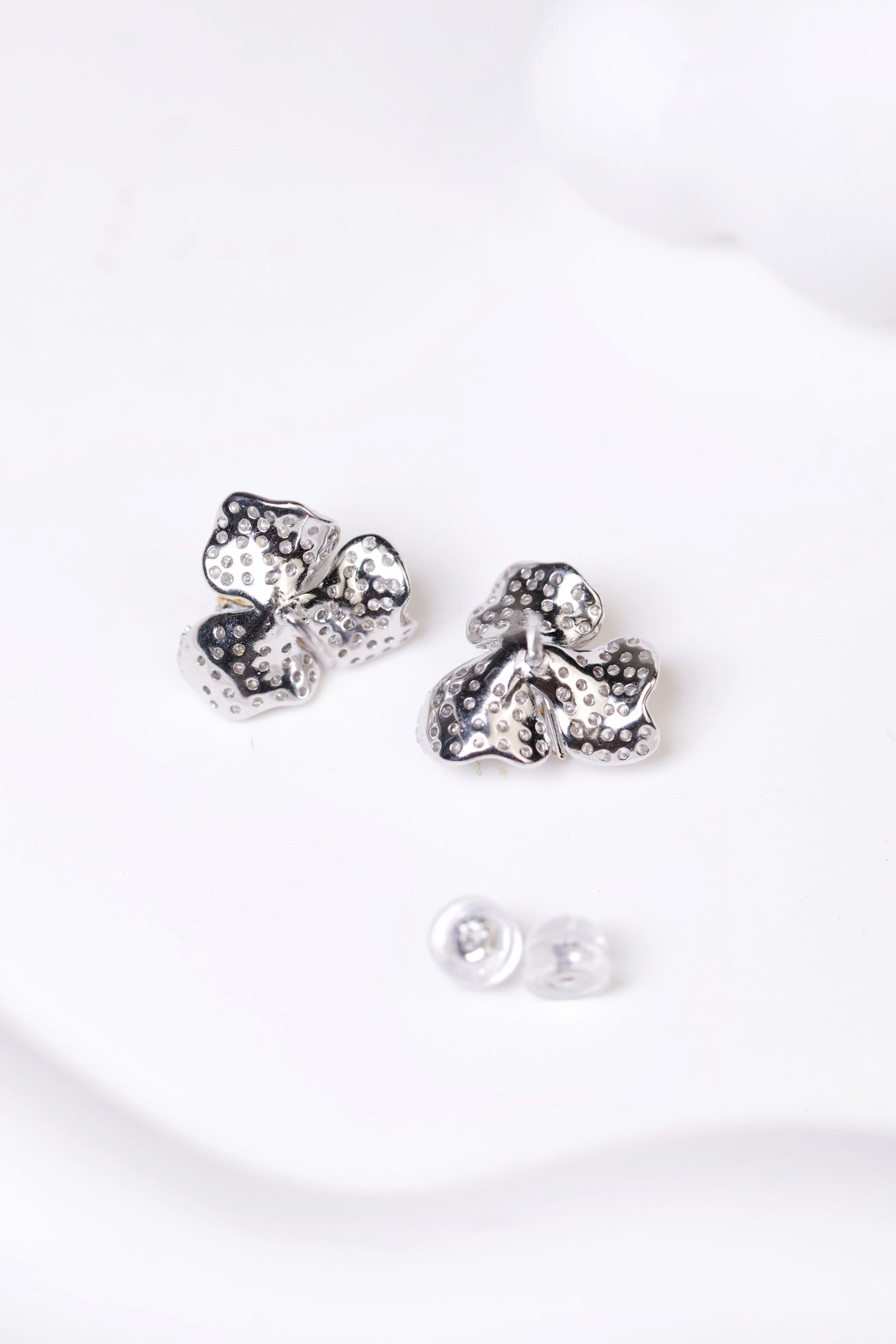 Diamond-Set Silver Flower Stud Earrings